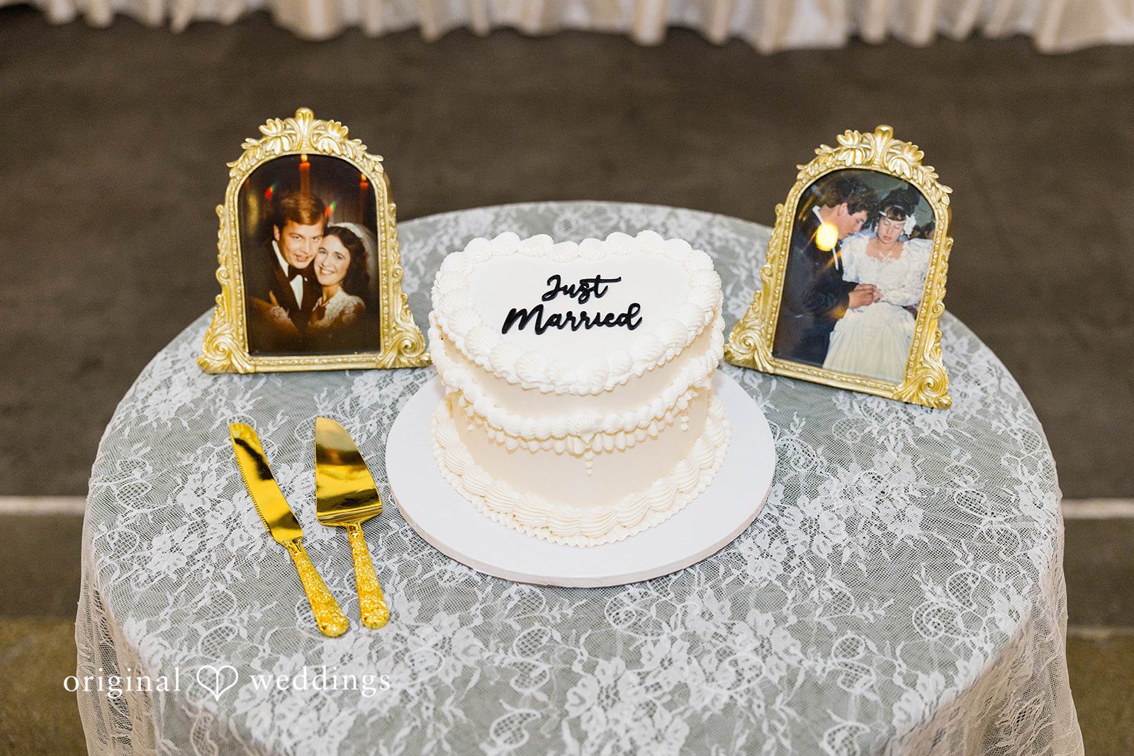 Andrea + Roberto Wedding cake with gold framed photos at The Crawford