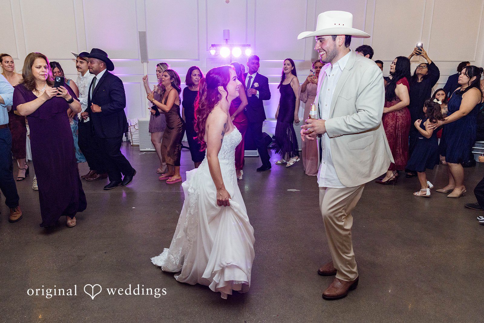 Andrea + Roberto Dance floor glowing in purple light