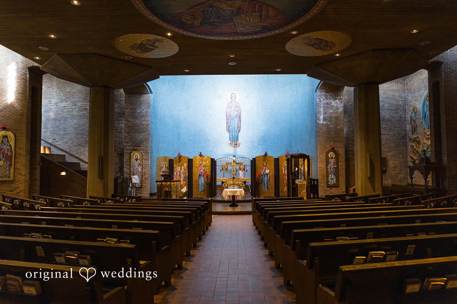 Andrea + Roberto Guests seated inside the Greek Orthodox church for the ceremony