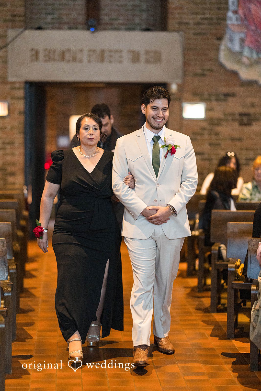 Andrea + Roberto Couple walking into The Crawford