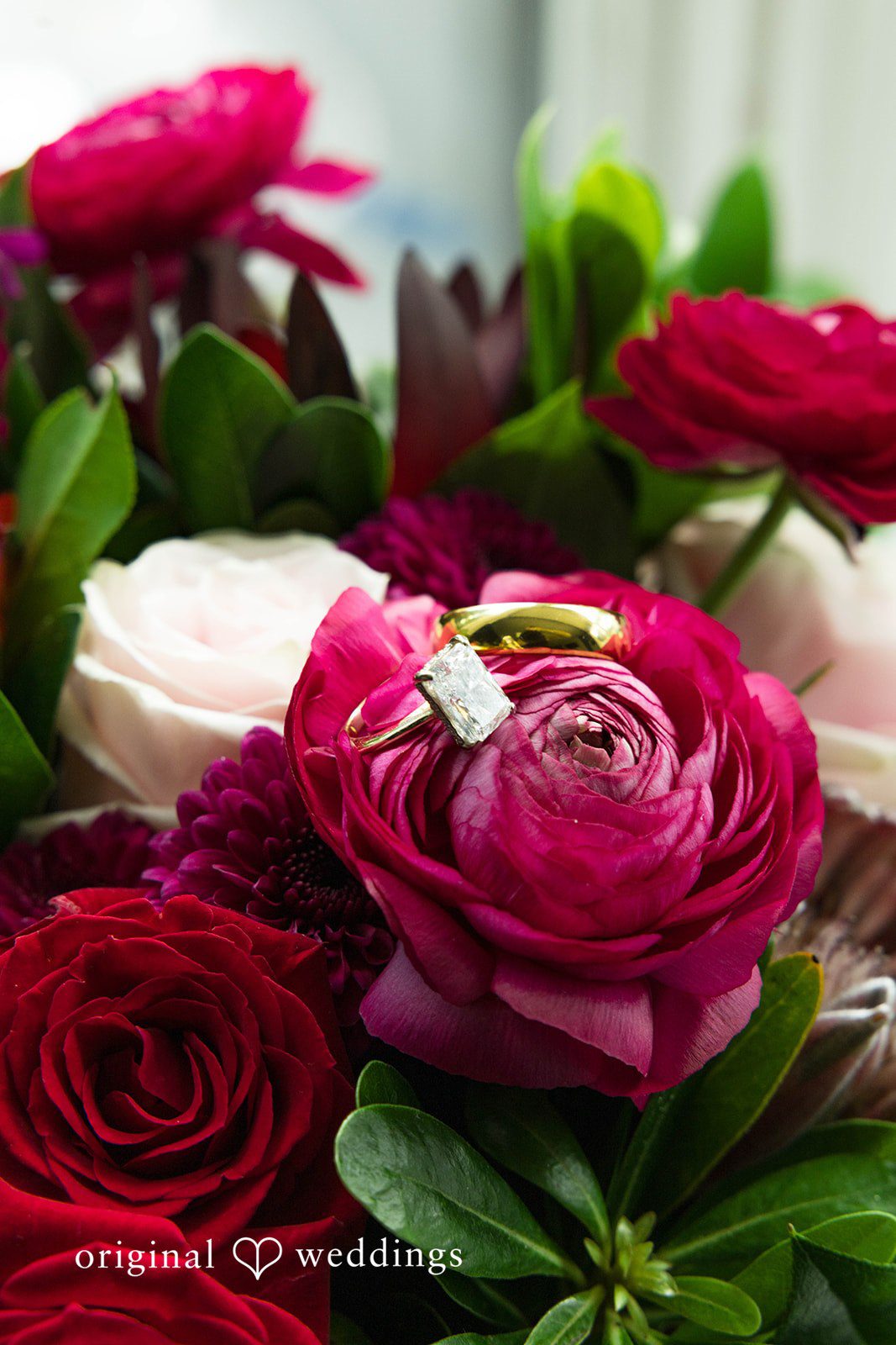 Andrea + Roberto Bride's bouquet of burgundy and red roses
