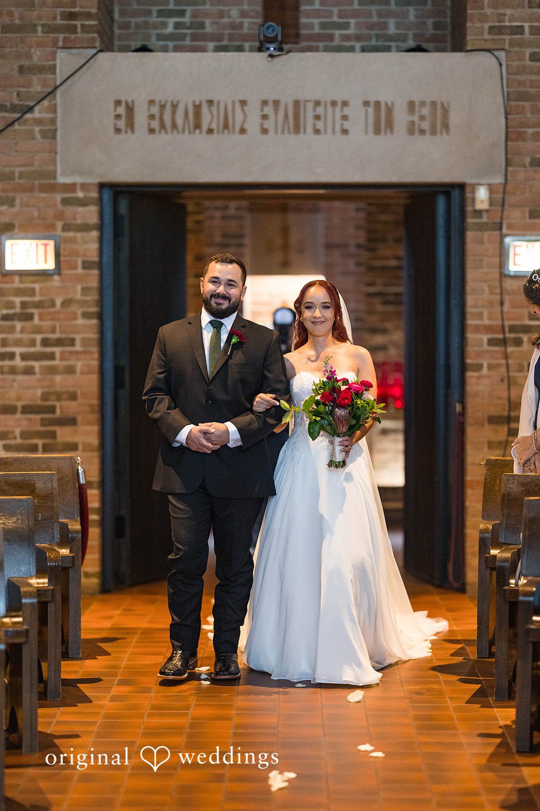 Andrea + Roberto Bride and groom at the front doors of The Crawford