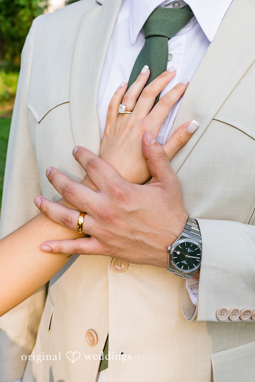 Andrea + Roberto Close up of the couple's hands and rings