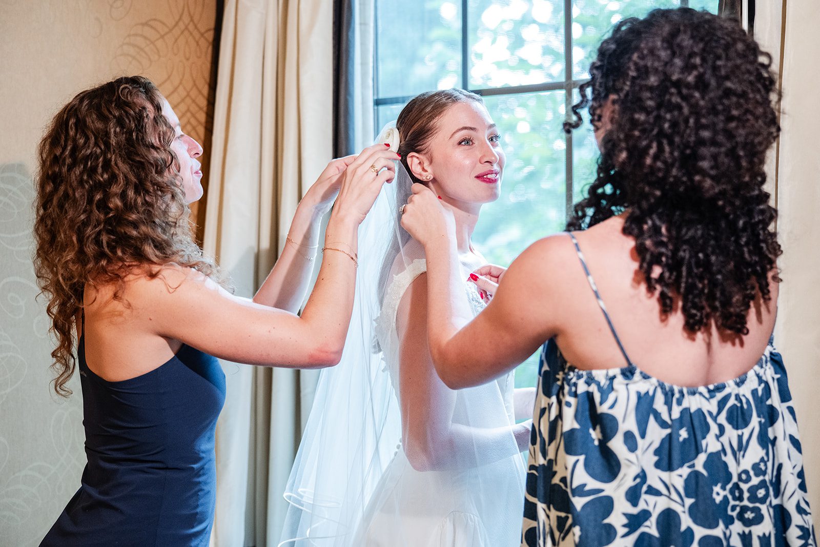 Bride getting ready with family