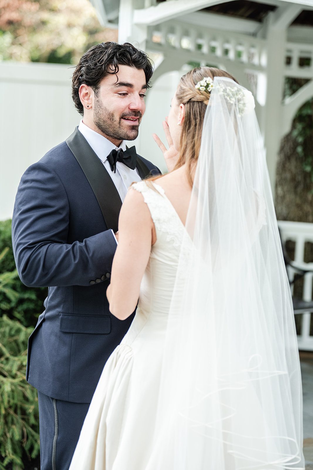 Groom holding the bride close