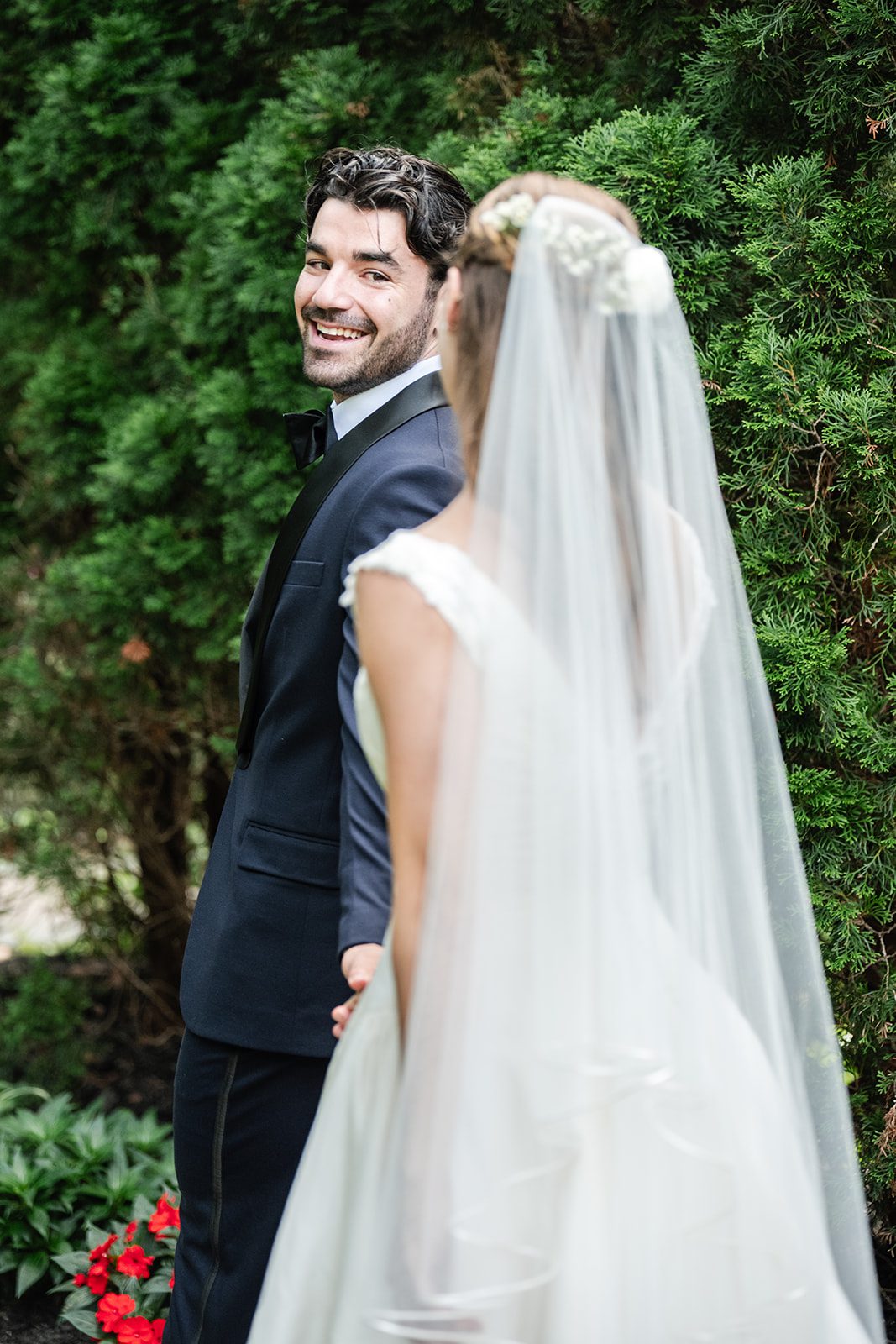 Couple posing among the flowers