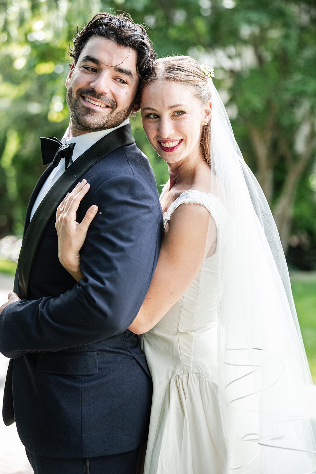 Bride and groom on the garden path at The Fox Hollow