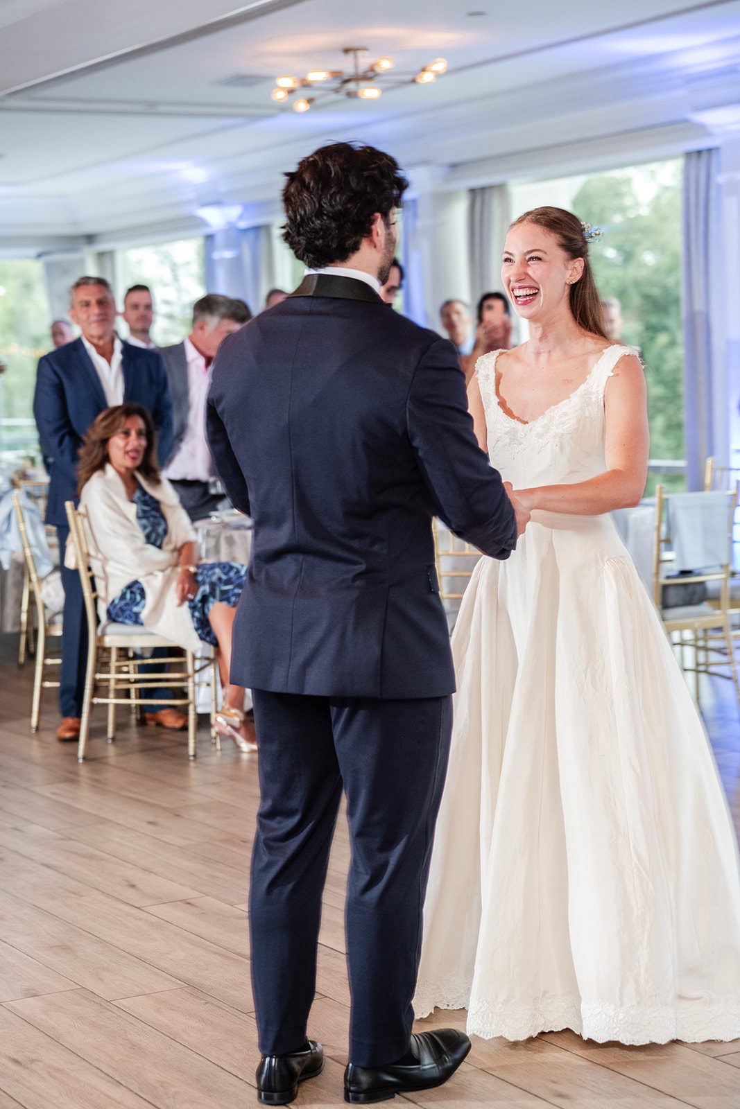 Bride and groom dancing in the ballroom