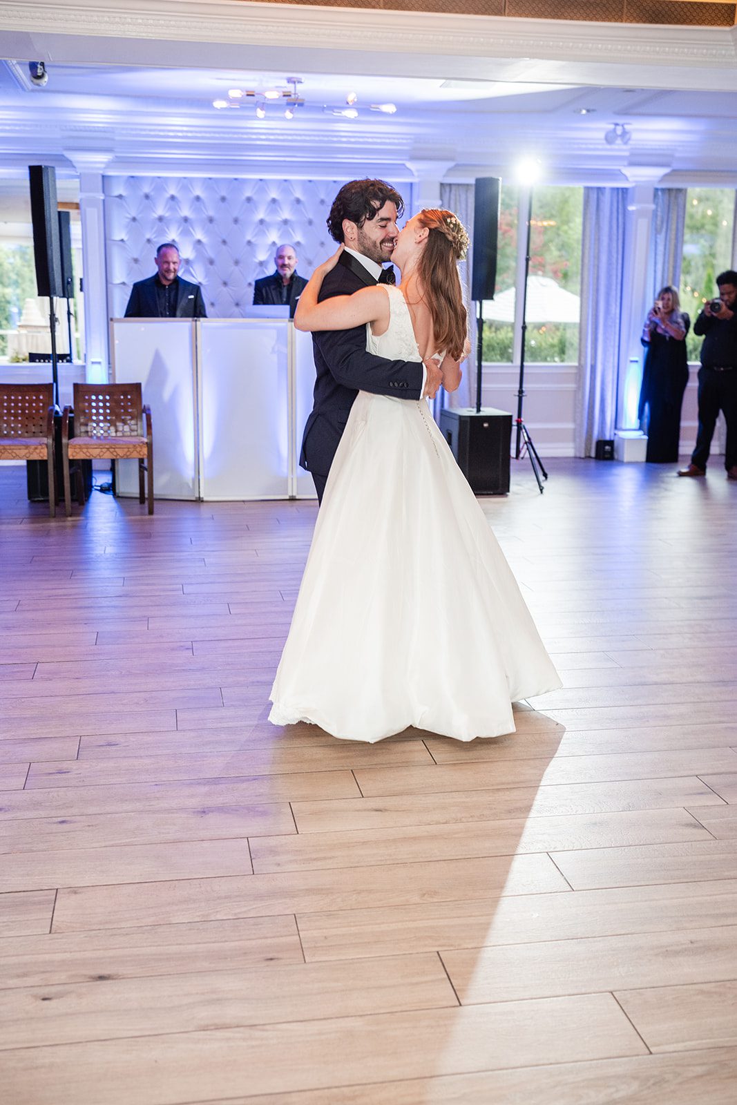 Couple dancing under the lights at The Fox Hollow
