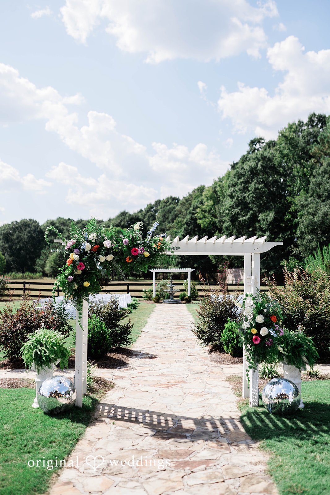 Katey + Liam Decorated wedding ceremony space at The Grove Estate