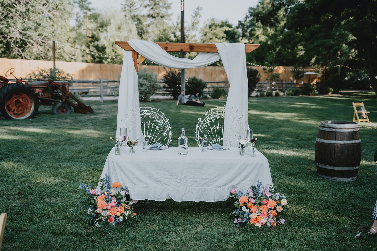Sweetheart table decorated with flowers
