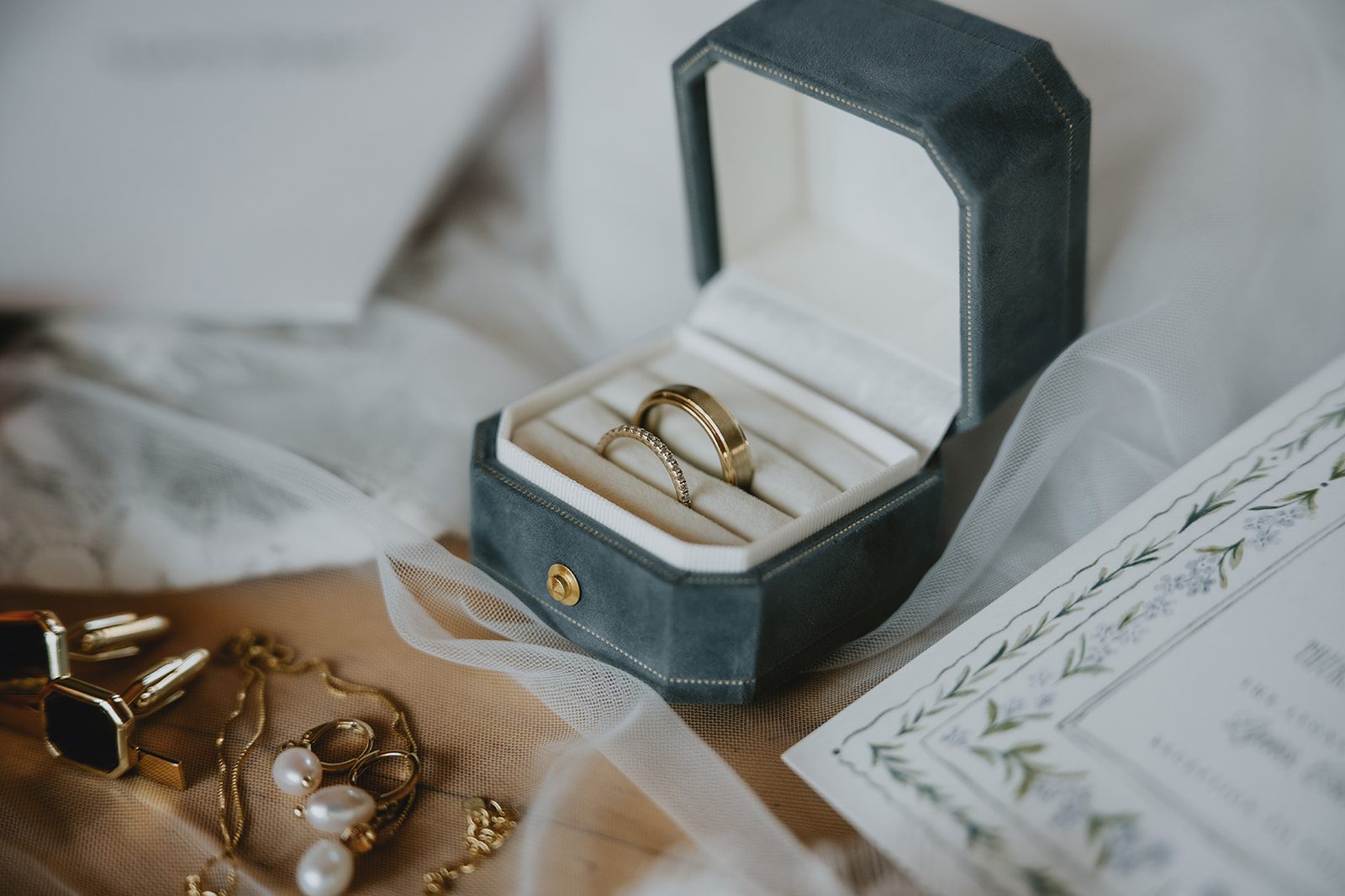 Wedding rings in a green ring box