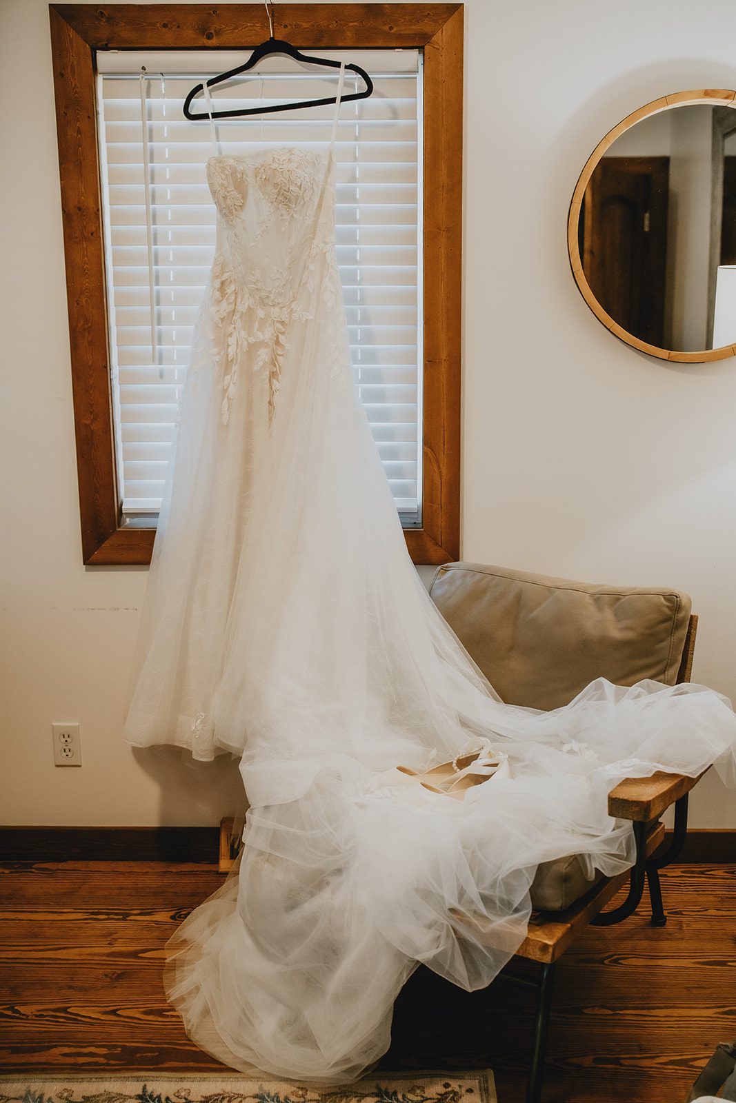 Wedding dress hanging in the farmhouse