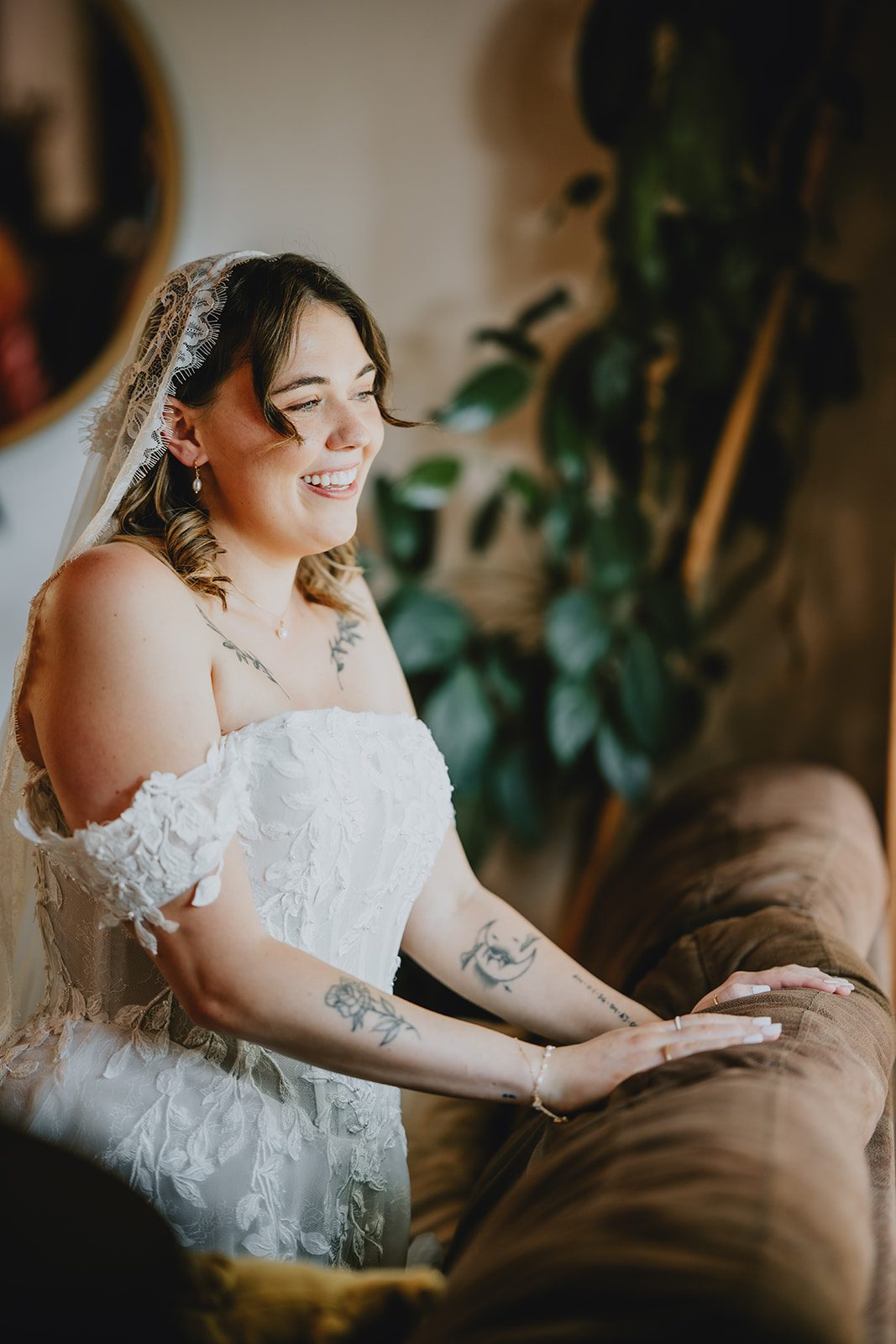 Bride getting ready in soft window light