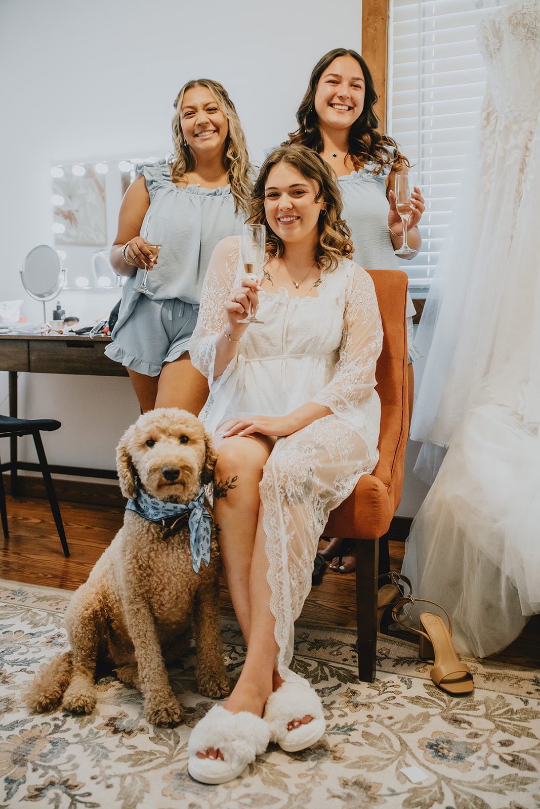 Bride relaxing with family and the dog before the ceremony