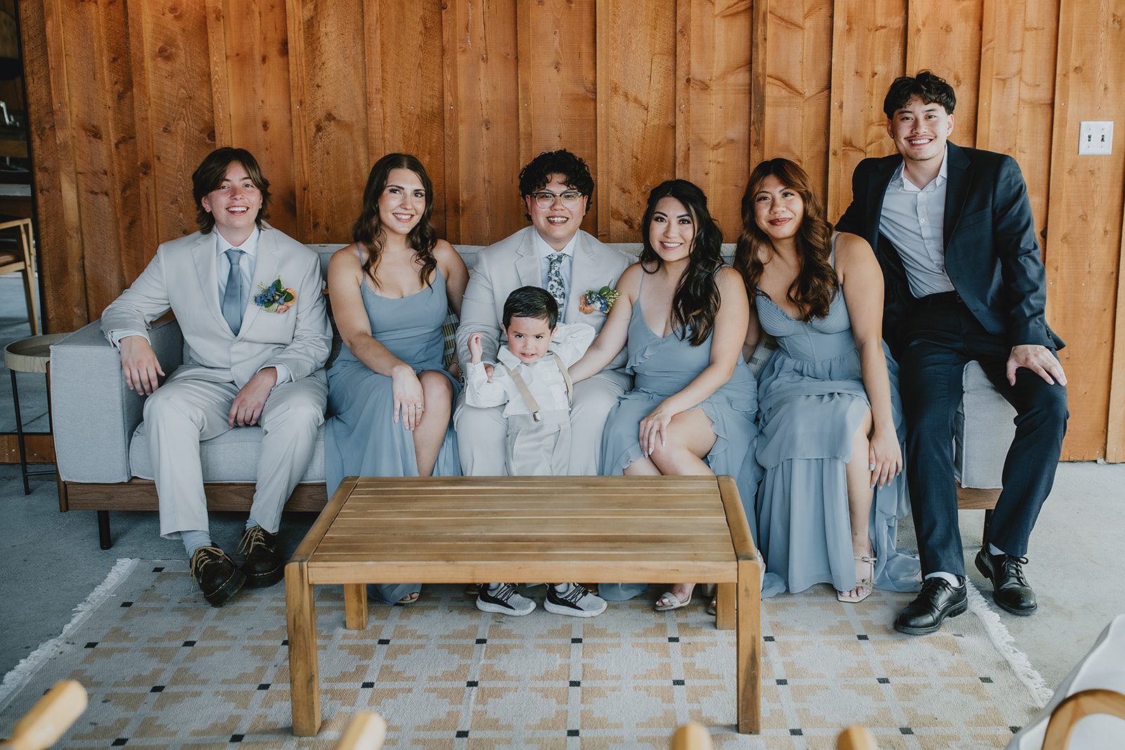 Partner with the wedding party in the farmhouse