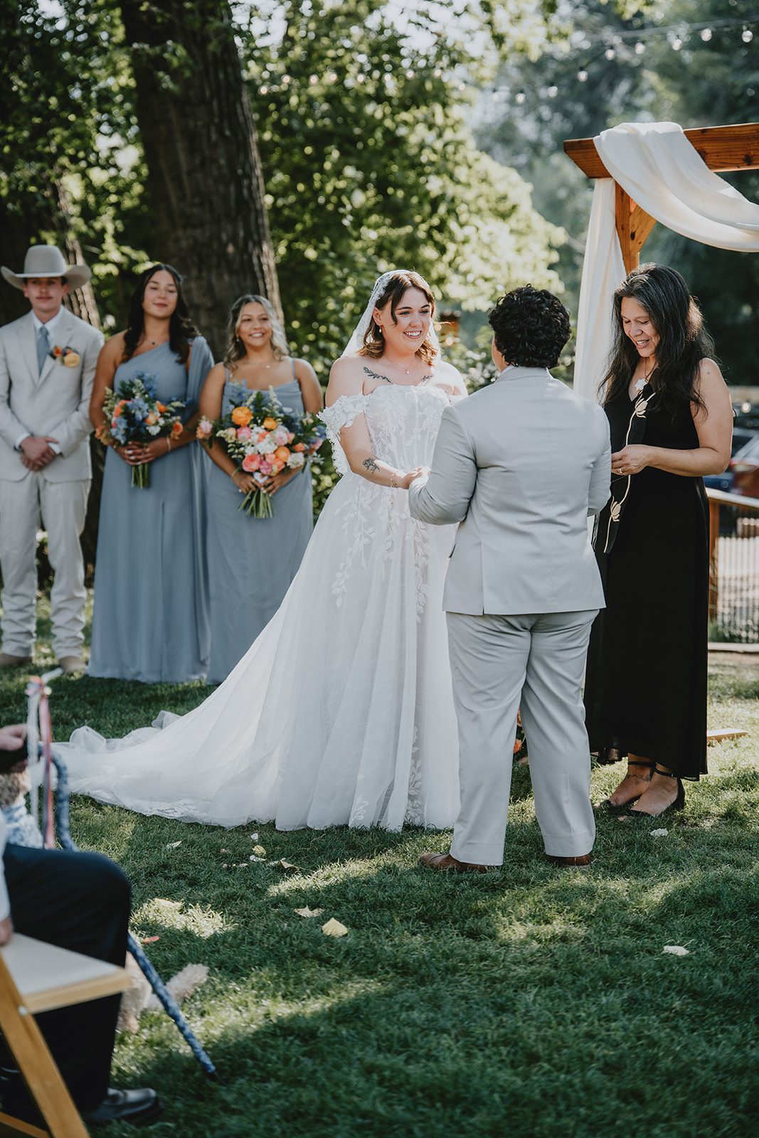 Couple holding hands during the ceremony