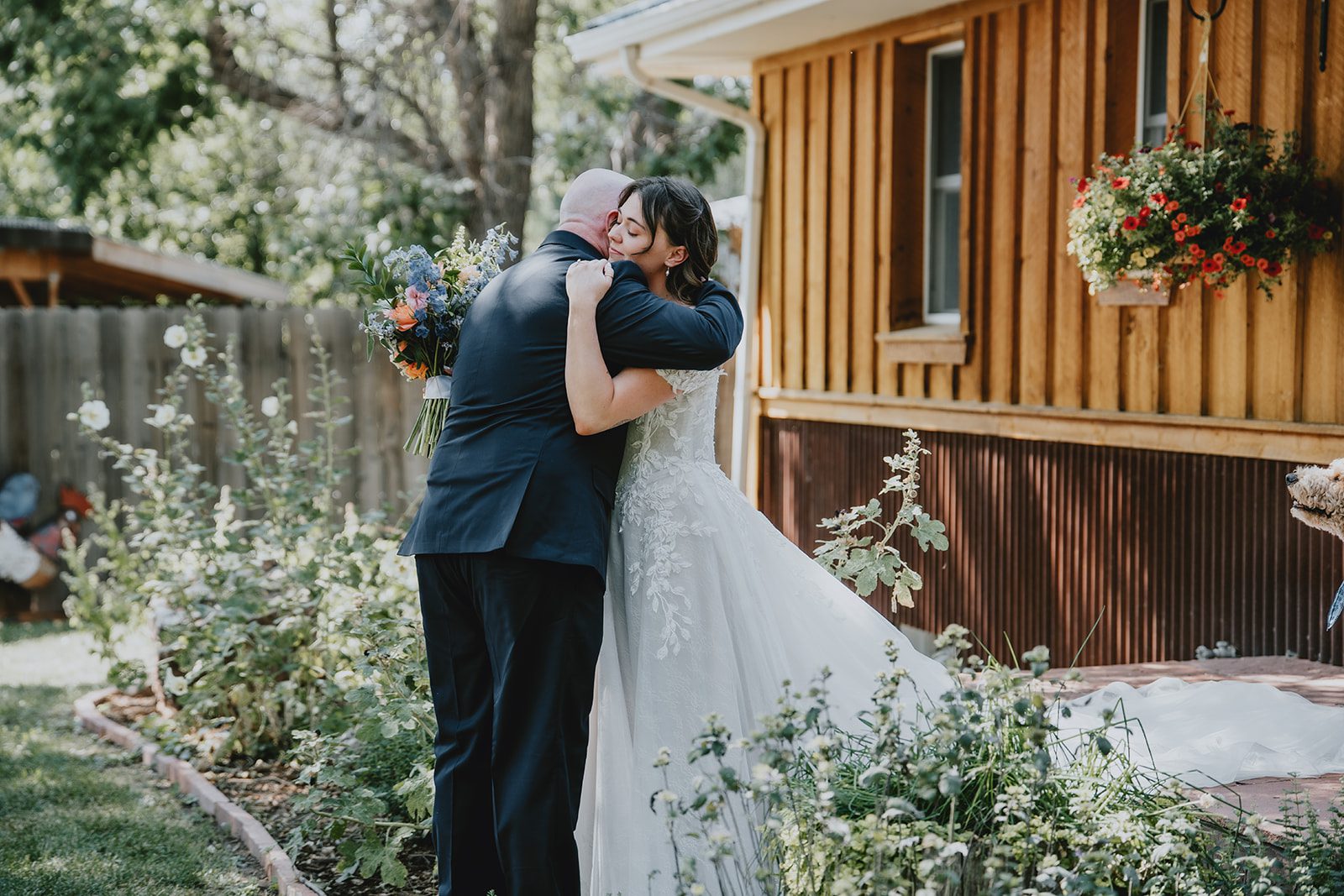 Couple hugging after the first look