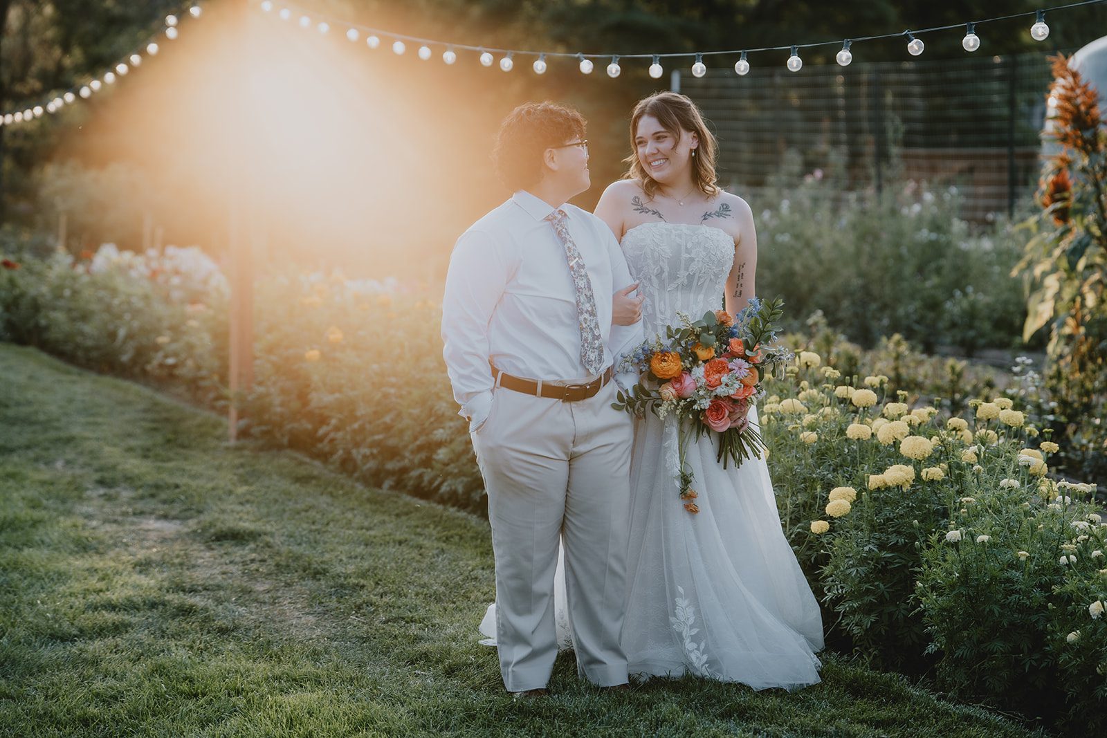 Couple embracing in sunset light