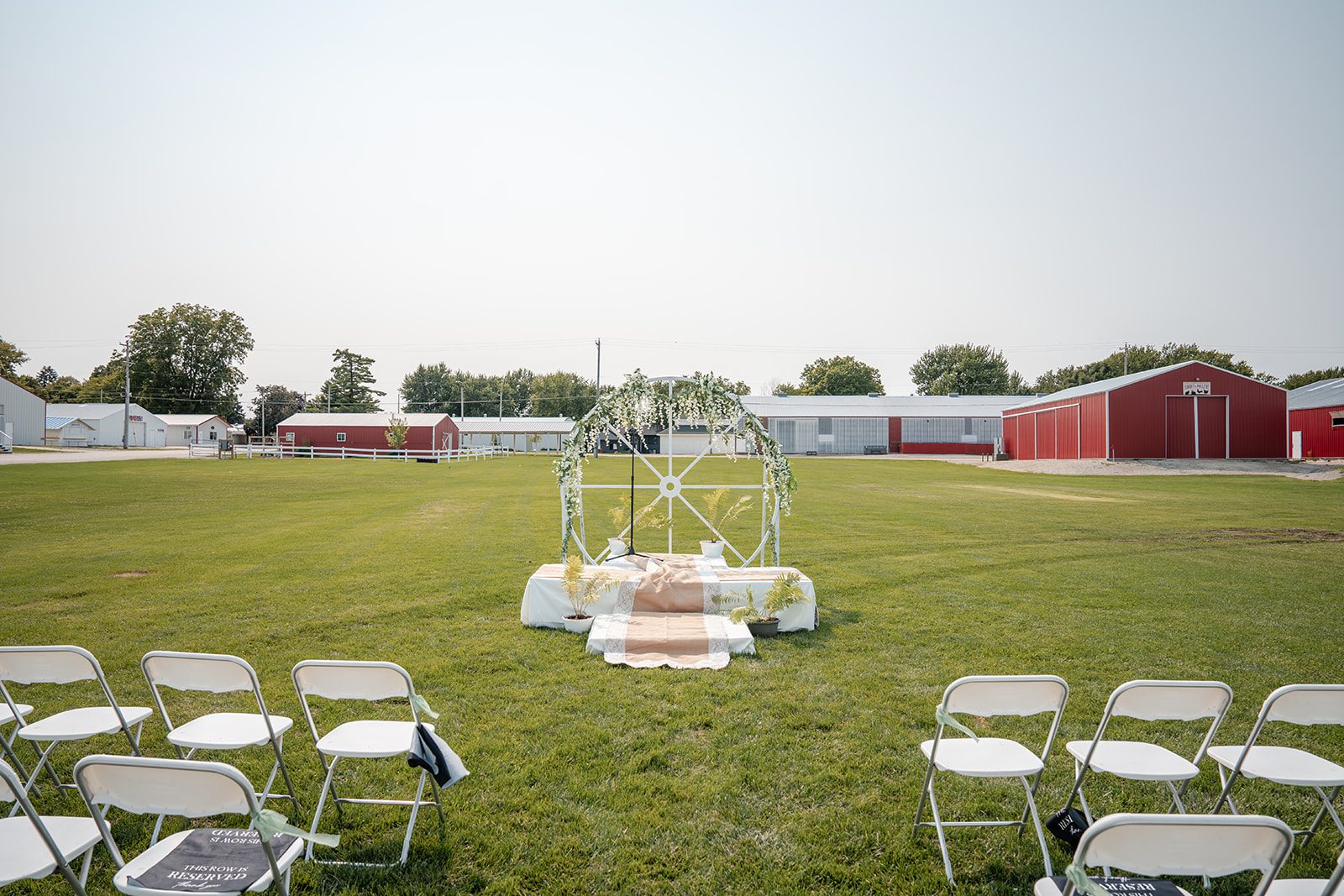 the-midway-timeless-minneapolis-sarah-drew-p001-16 Outdoor ceremony setup on the open lawn at The Midway