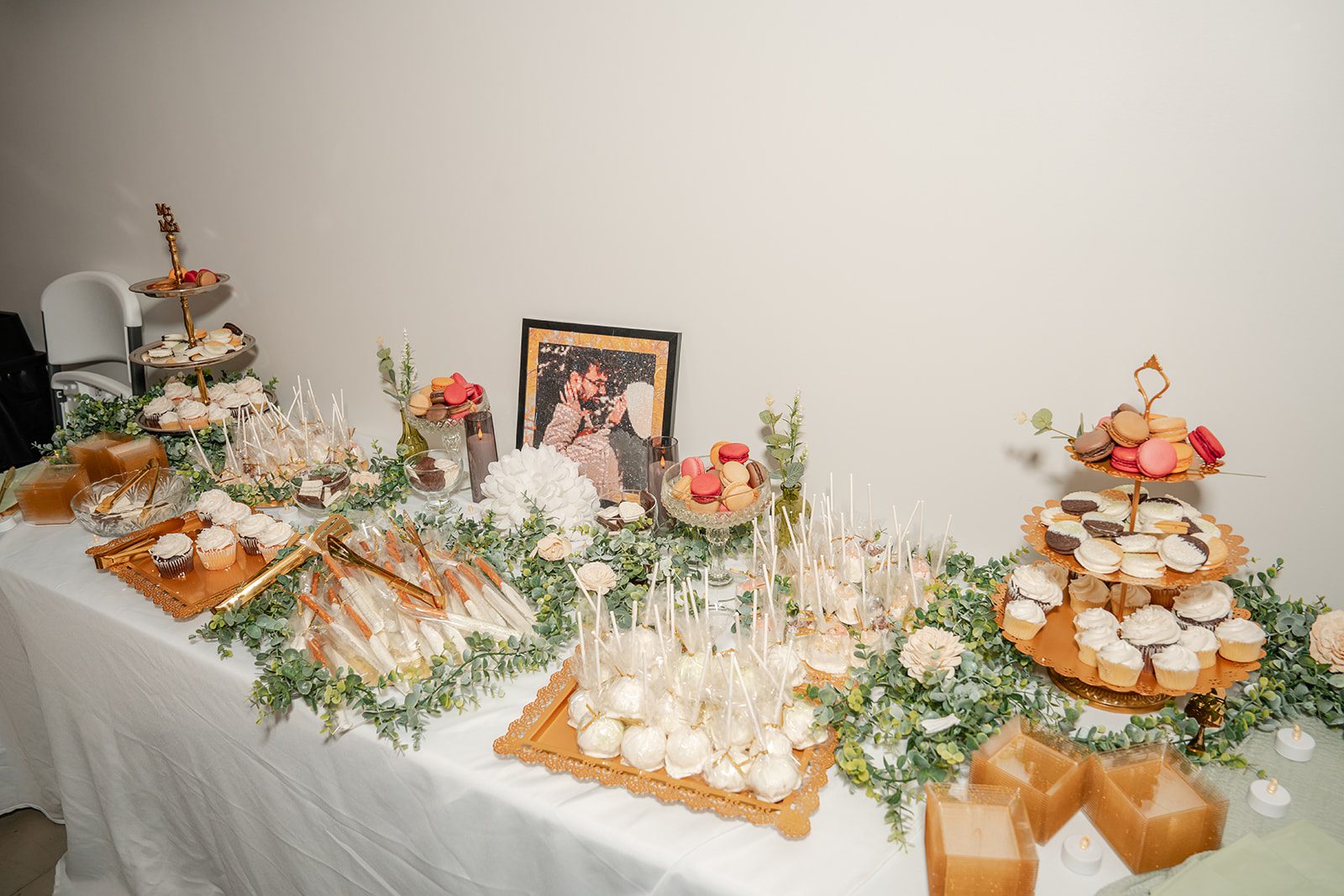 the-midway-timeless-minneapolis-sarah-drew-p003-35 Dessert table with treats and greenery at The Midway