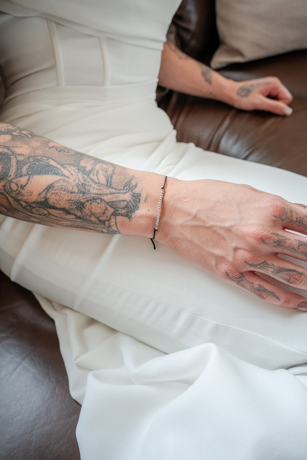the-midway-timeless-minneapolis-sarah-drew-p007-10 Bride's tattooed arm with a delicate bracelet