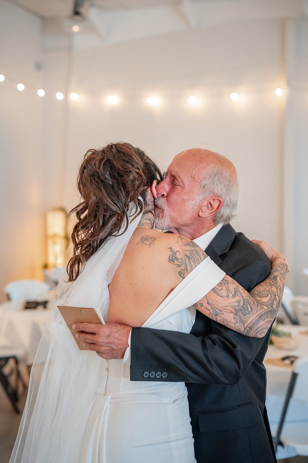 the-midway-timeless-minneapolis-sarah-drew-p014-31 Bride hugging her dad before the ceremony
