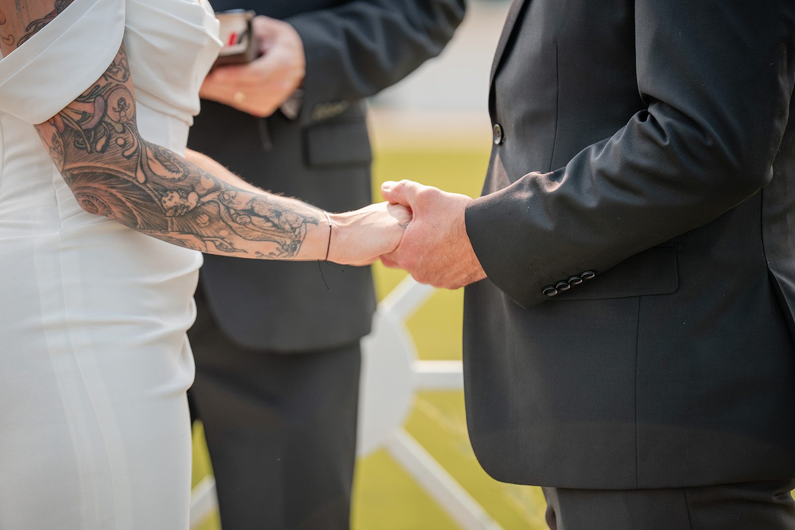 the-midway-timeless-minneapolis-sarah-drew-p017-14 Couple exchanging rings during the ceremony