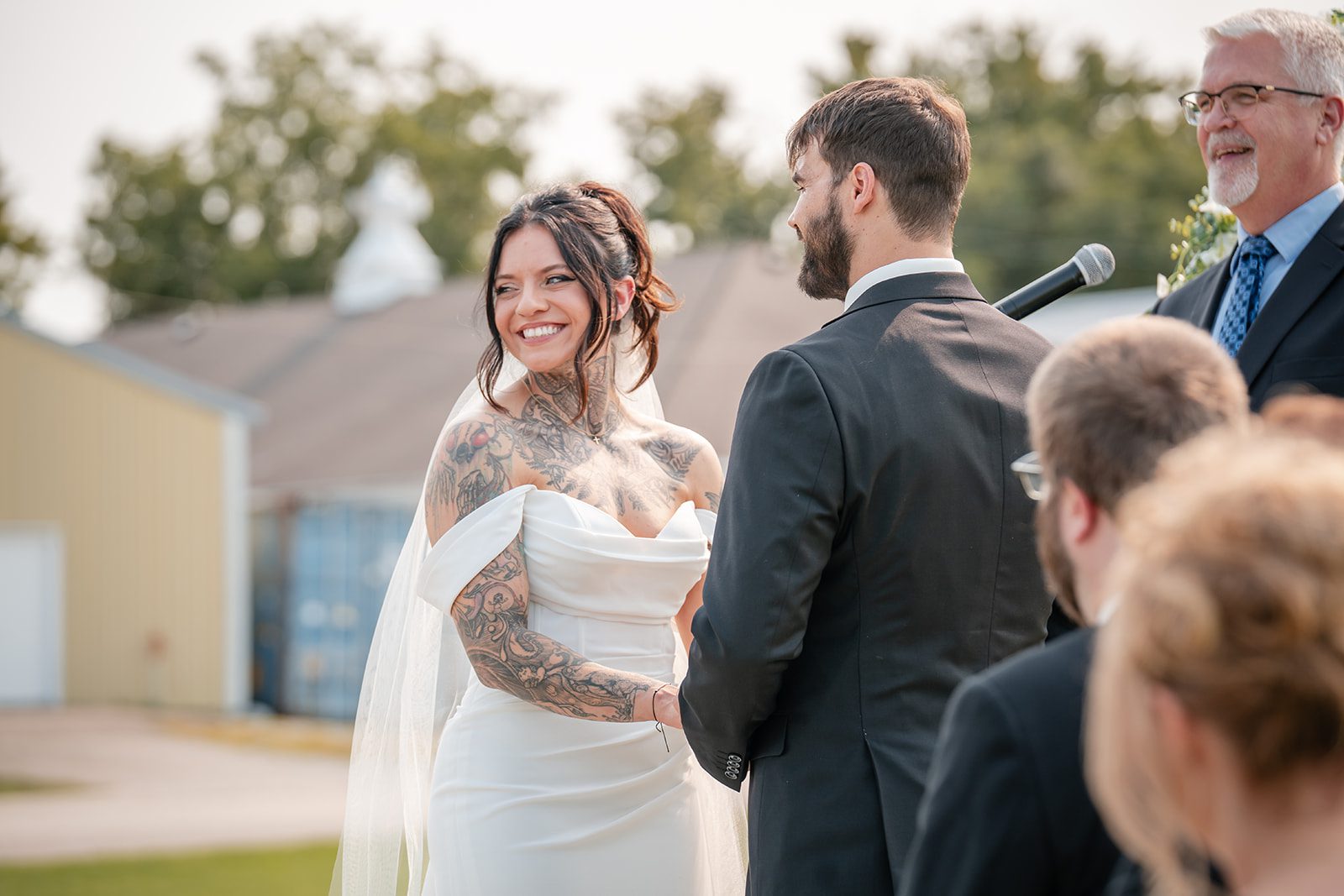 the-midway-timeless-minneapolis-sarah-drew-p018-03 Guests watching the outdoor ceremony