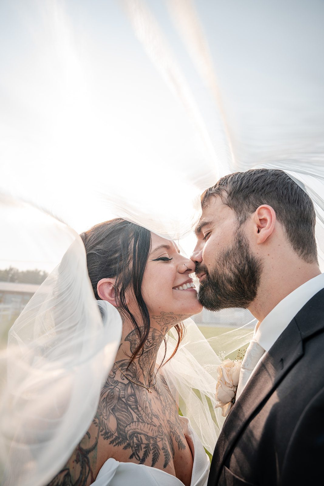 the-midway-timeless-minneapolis-sarah-drew-p035-06 Couple sharing a kiss in soft evening light