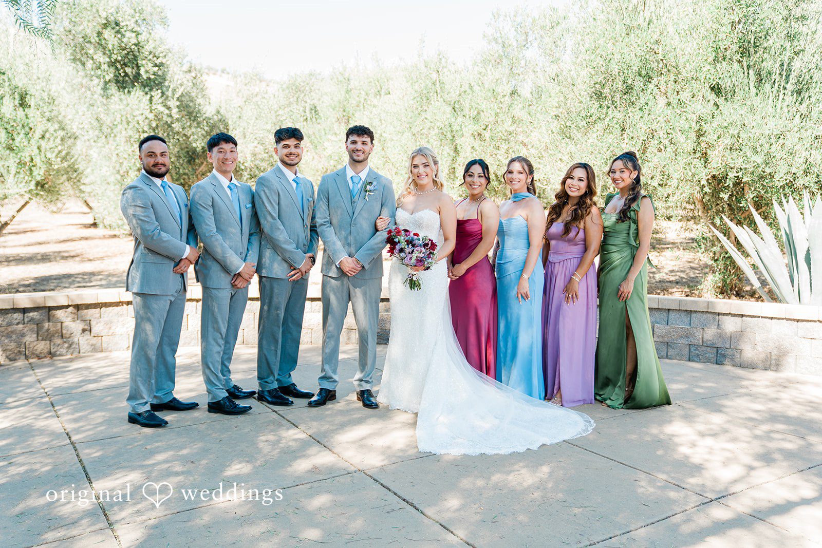 Savannah + Lucas Couple with their wedding party at The Purple Orchid