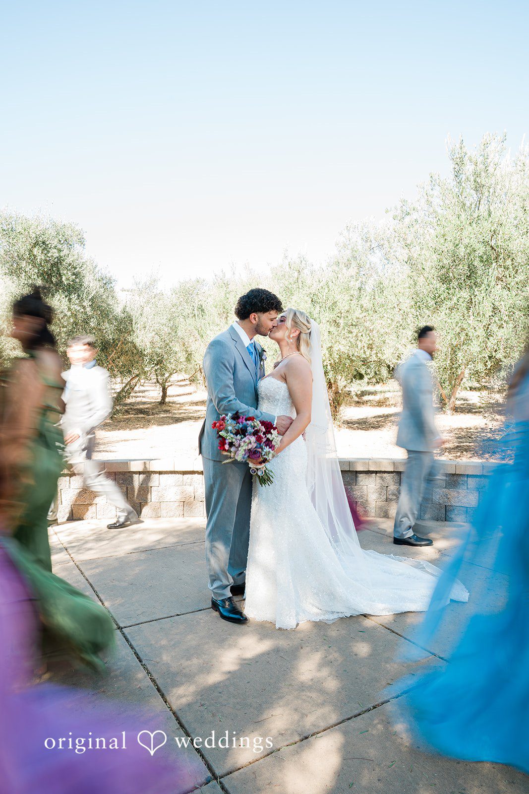 Savannah + Lucas Bride and groom dancing with family
