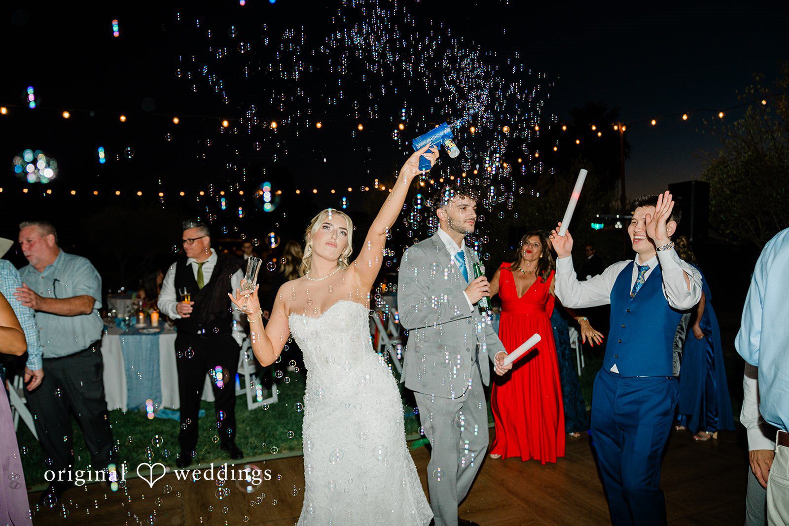 Savannah + Lucas Bride celebrating with confetti on the dance floor