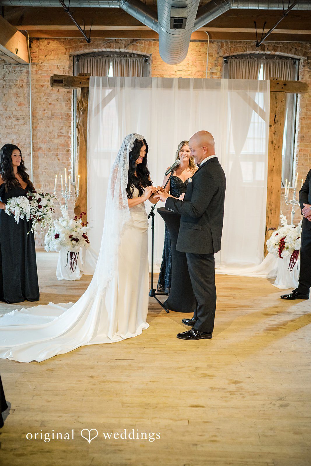 August 01, 2026 – Haley & Austin – (ID-4892) A wide shot of the bride walking down a brightly lit aisle towards the altar.