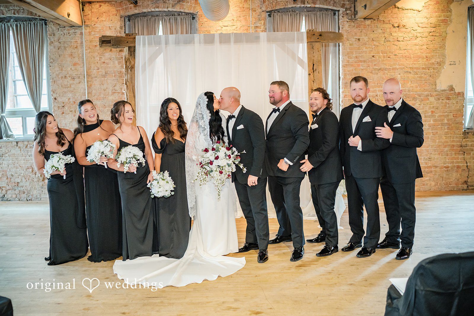 August 01, 2026 – Haley & Austin – (ID-4892) The full wedding party posing together for a group portrait.