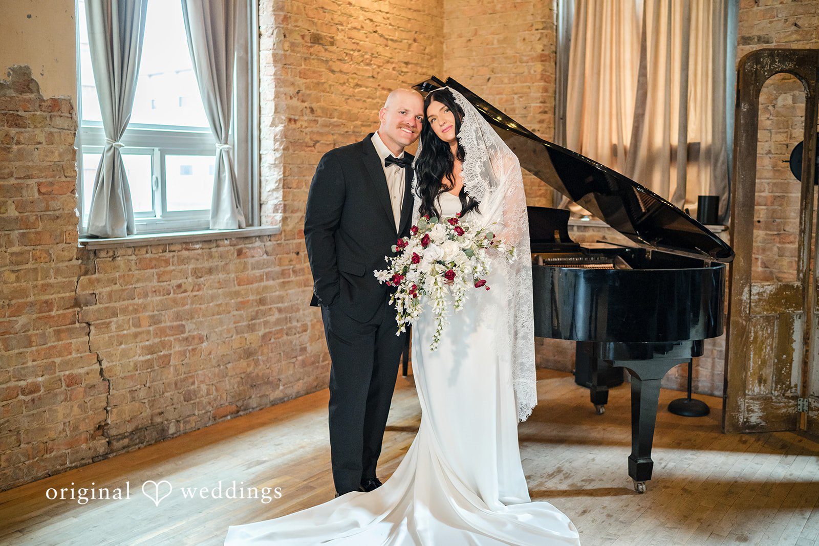 August 01, 2026 – Haley & Austin – (ID-4892) A bride holding a bouquet while standing next to a groom in front of a dark grand piano.