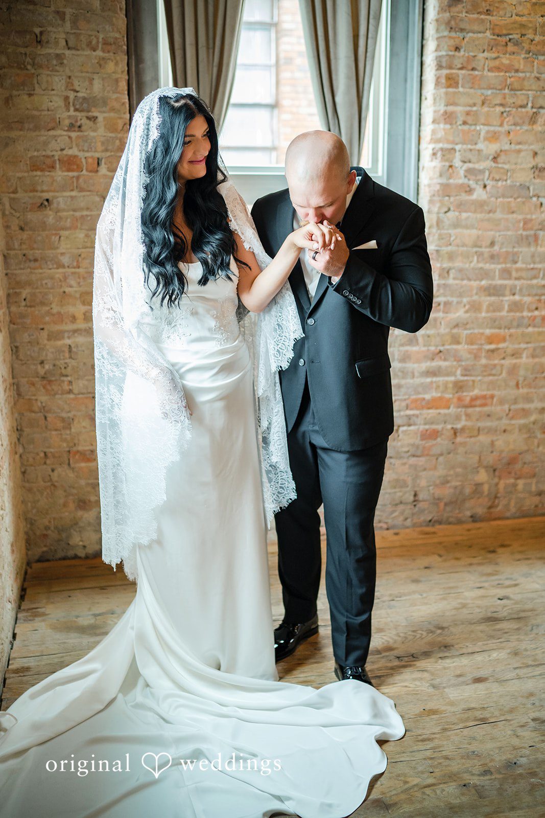 August 01, 2026 – Haley & Austin – (ID-4892) A bride and a man in a suit sharing an emotional moment together.