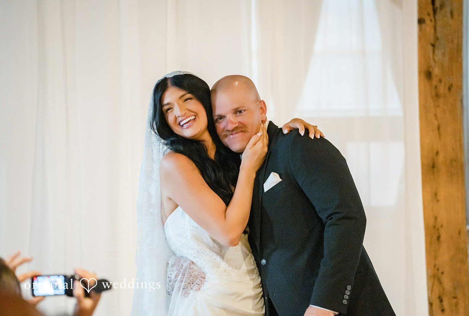 Bride and groom smiling cheek to cheek, captured by Chicago wedding photographers from Original Weddings at The Wagner House