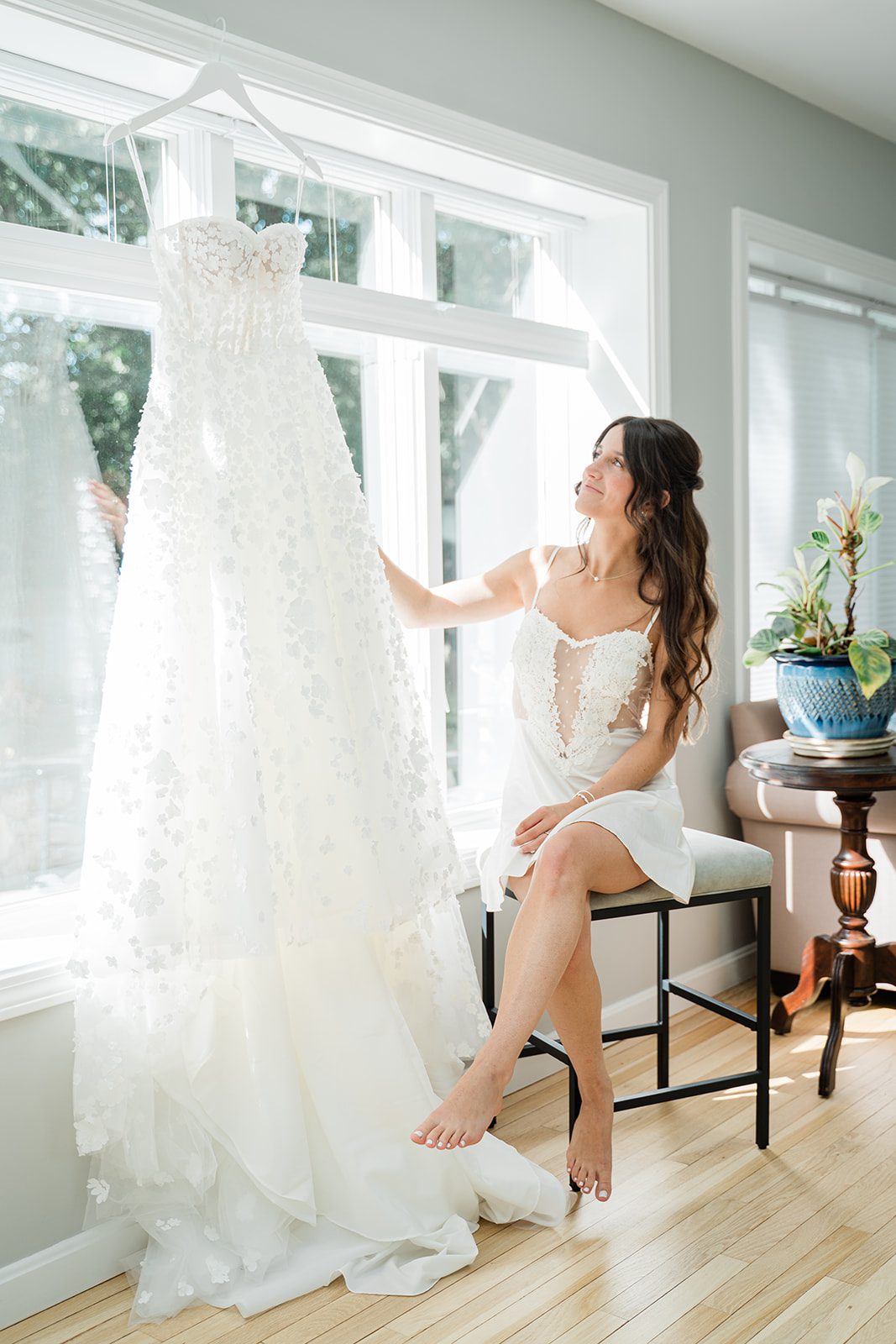 the-wharf-airy-boston-lia-cam-005-34 Wedding gown on a hanger