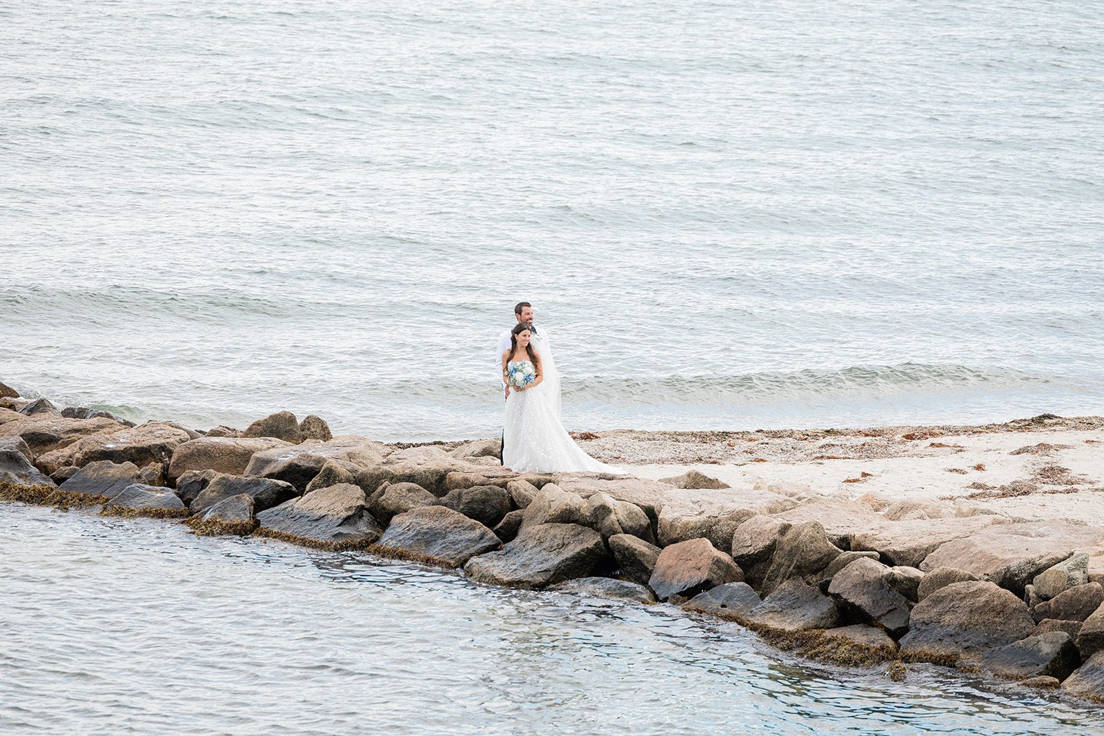 the-wharf-airy-boston-lia-cam-028-38 Bride standing on the rocks