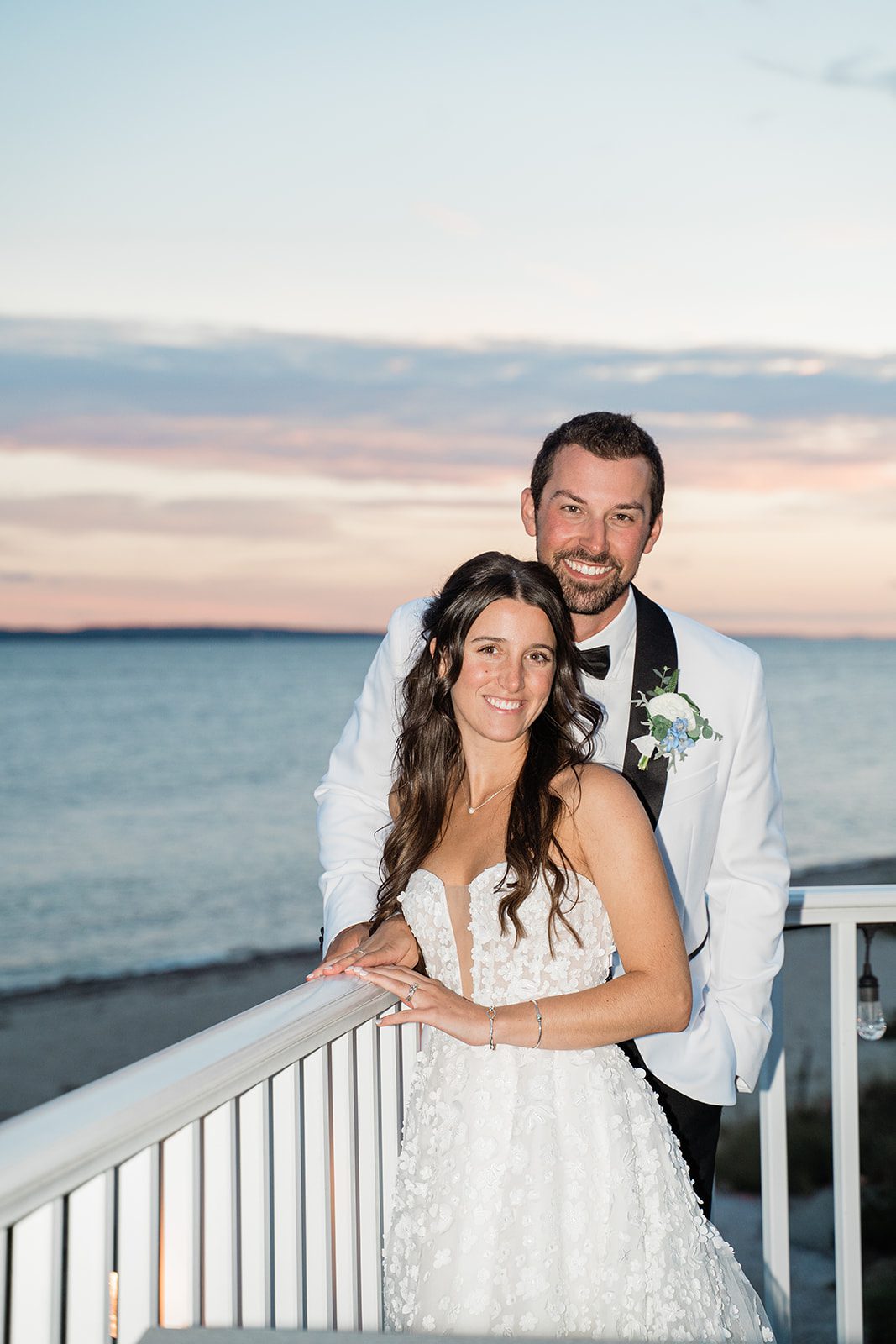 the-wharf-airy-boston-lia-cam-032-11 Bride and groom on the deck at dusk