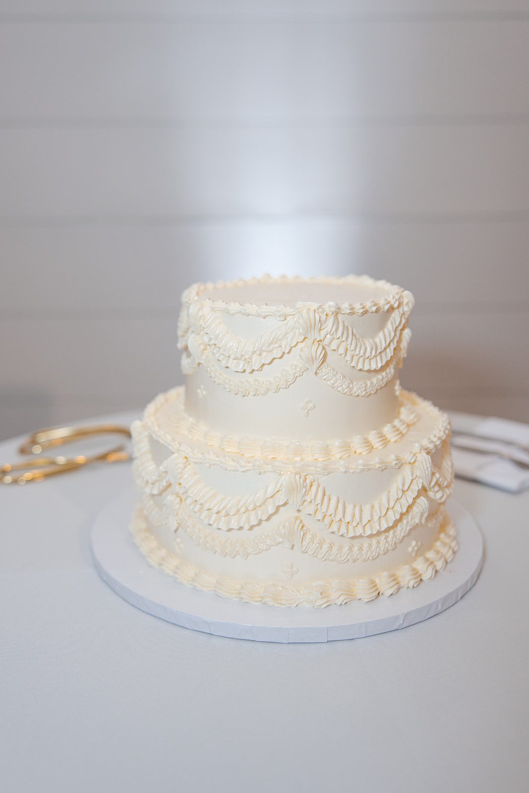 White wedding cake with delicate details