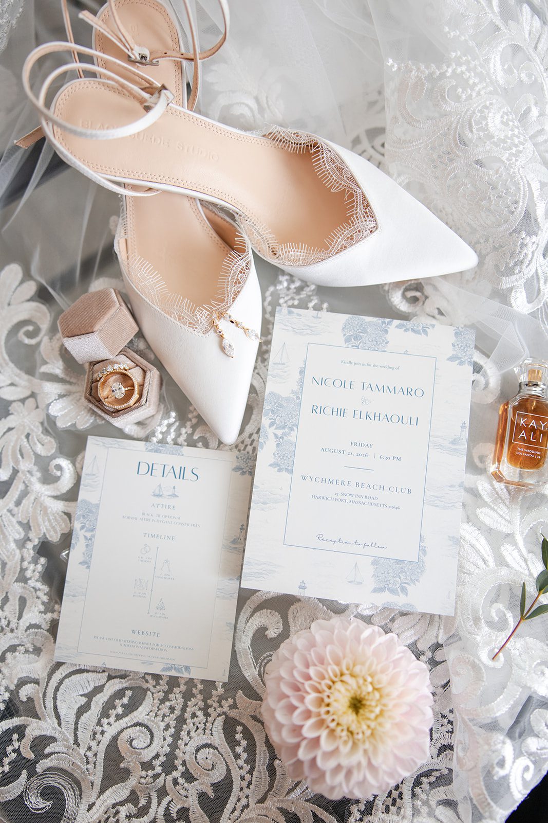 Bridal shoes, invitation and wedding details