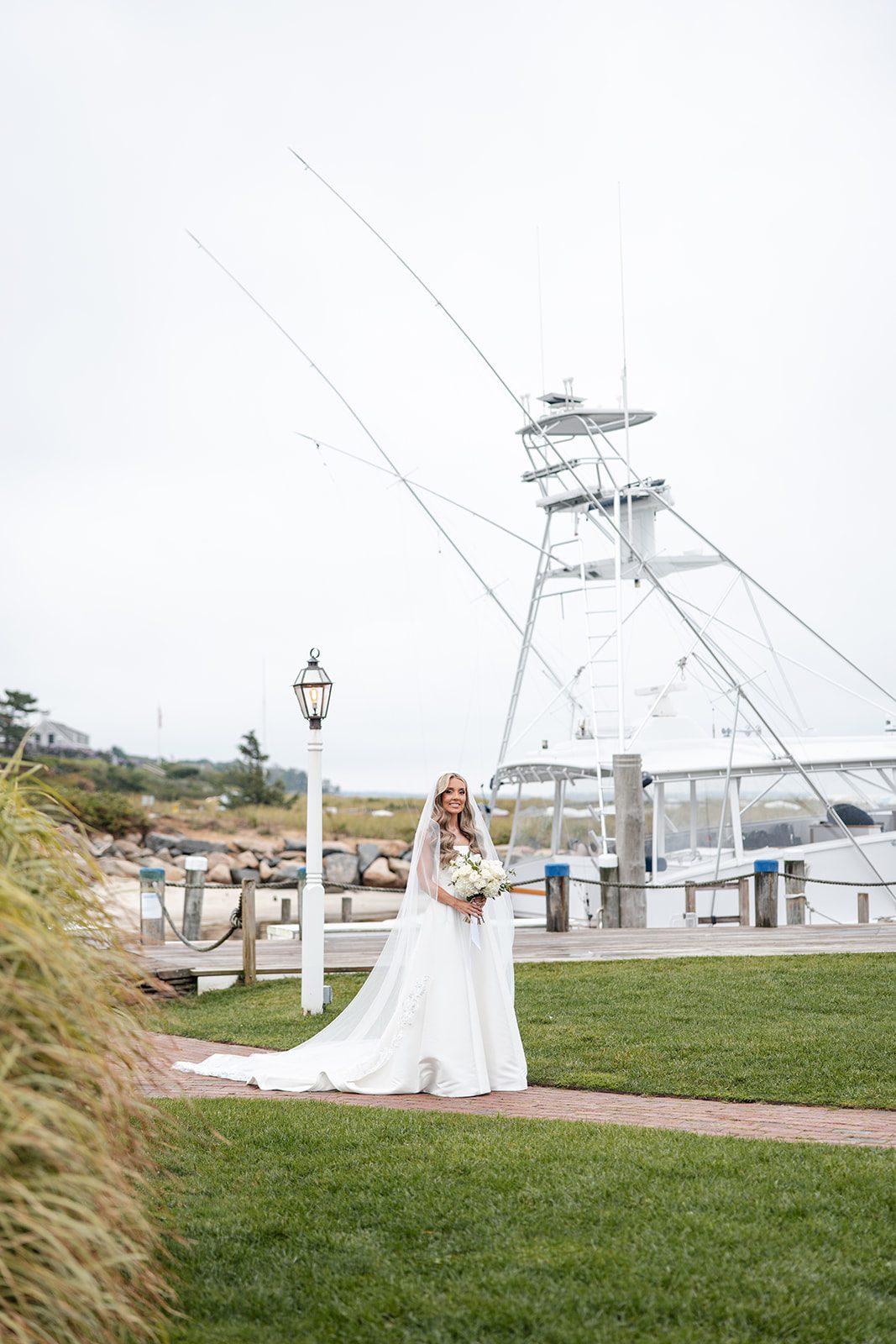 Bride on the lawn near the harbor
