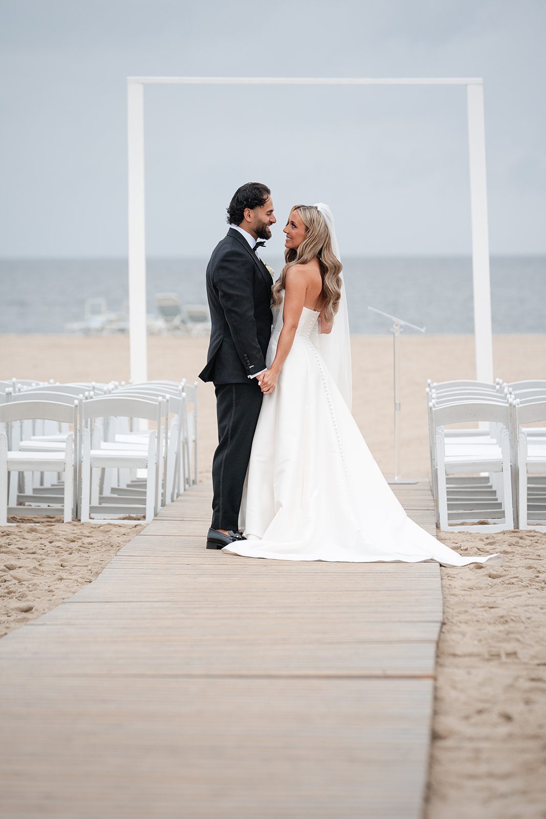 Couple on the boardwalk to the beach