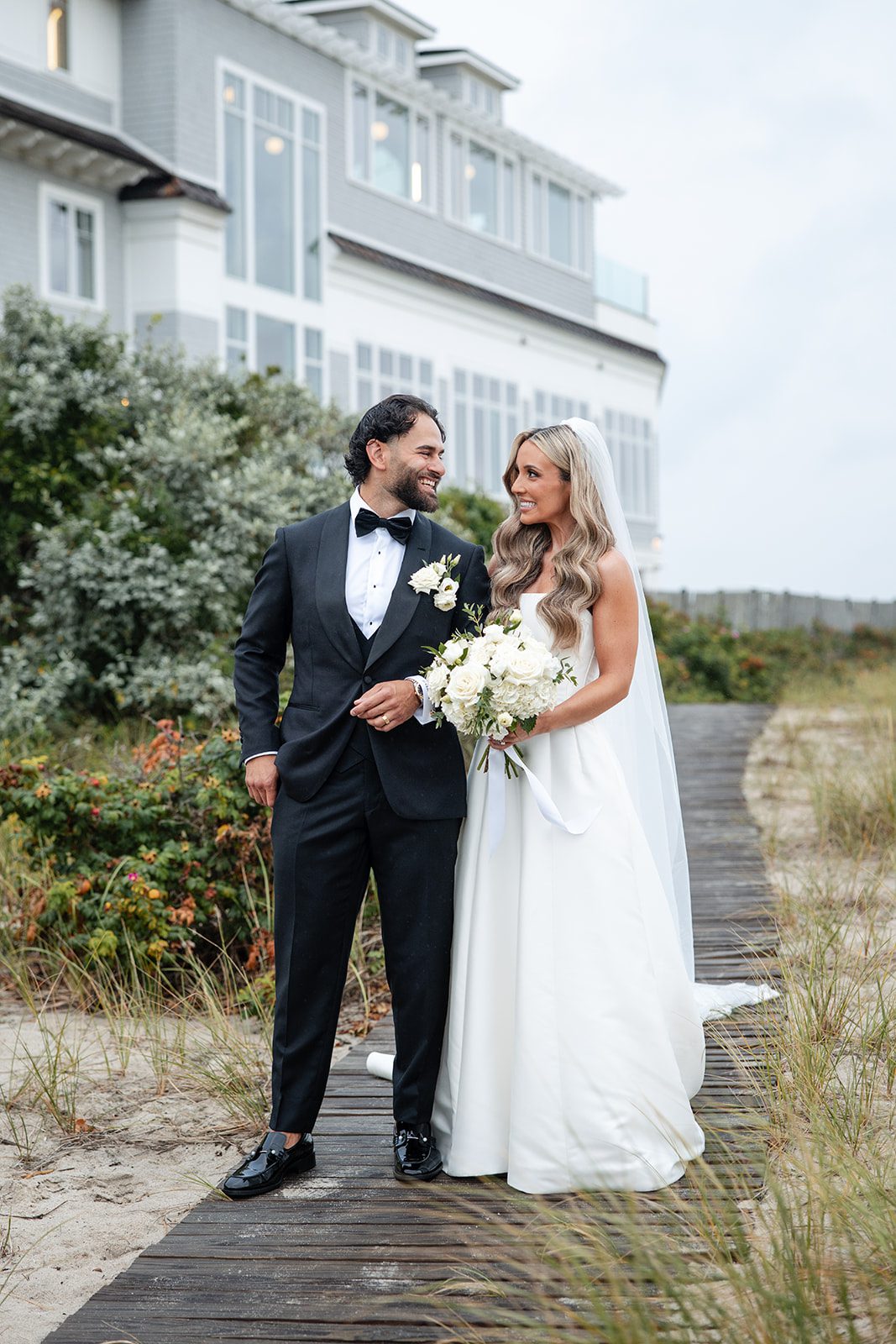 Bride and groom on the dune path