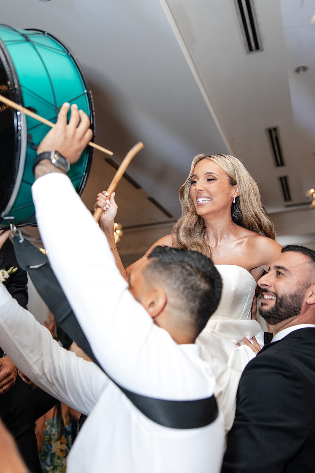 Wedding party dancing with excitement