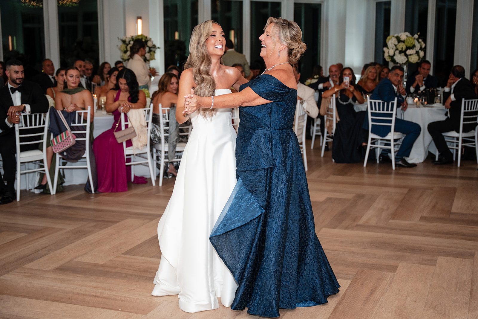 Bride sharing a dance with a loved one