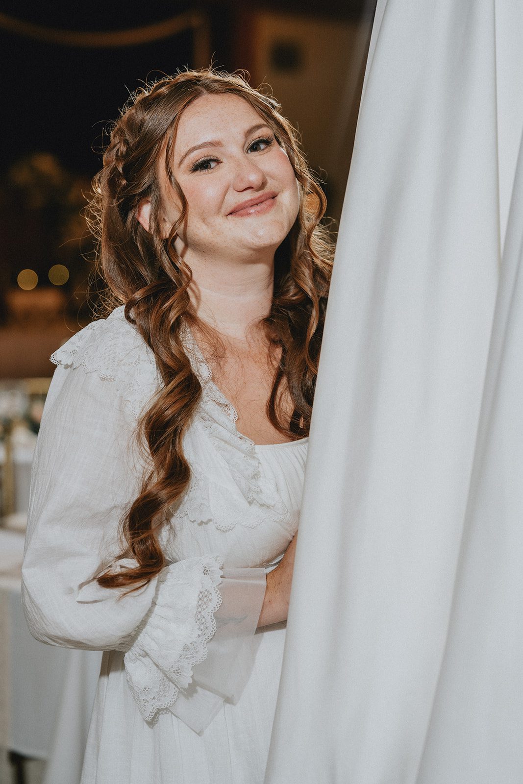 Bride smiling in her gown
