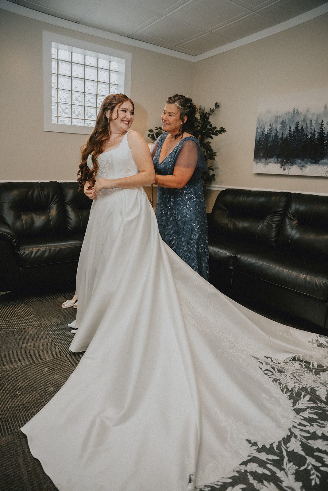 Bride showing off her dress train